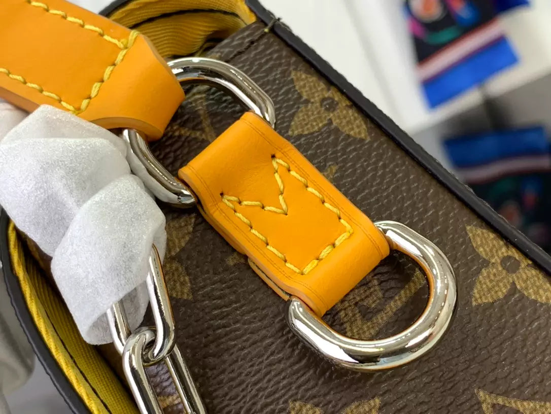 ルイ・ヴィトン スティーマー ウェアラブルウォレット イエロー サフラン モノグラム マカッサル – LW146