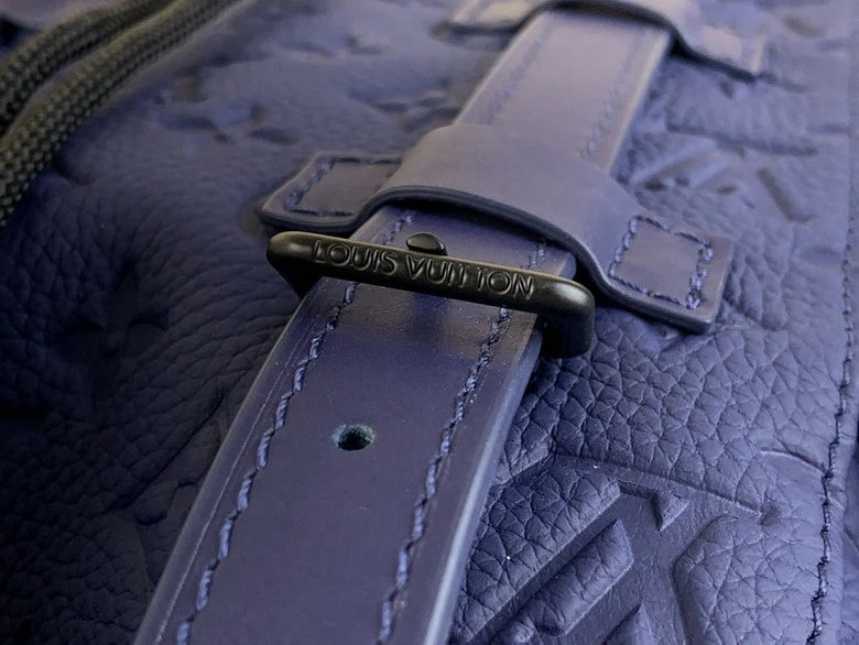 クリストファー MM バックパック ブルーモノグラム トリヨンレザー – LW160