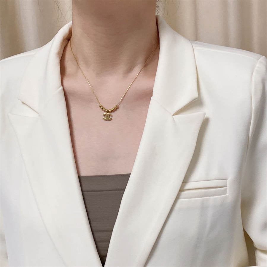 シャネル ダブルC イエローゴールド ビーズ ペンダント ネックレス