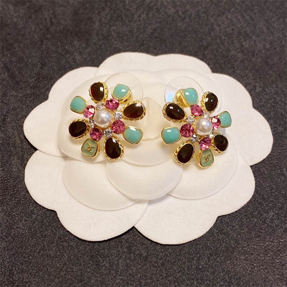 シャネルのカラフルなオイルドリップの花びらのイヤリング