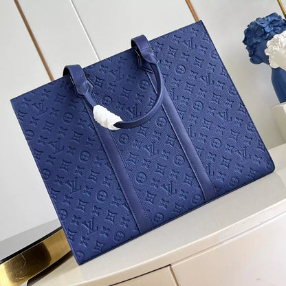 24H フラットバッグ サファイア トリヨン モノグラムレザー M11690 – LW328