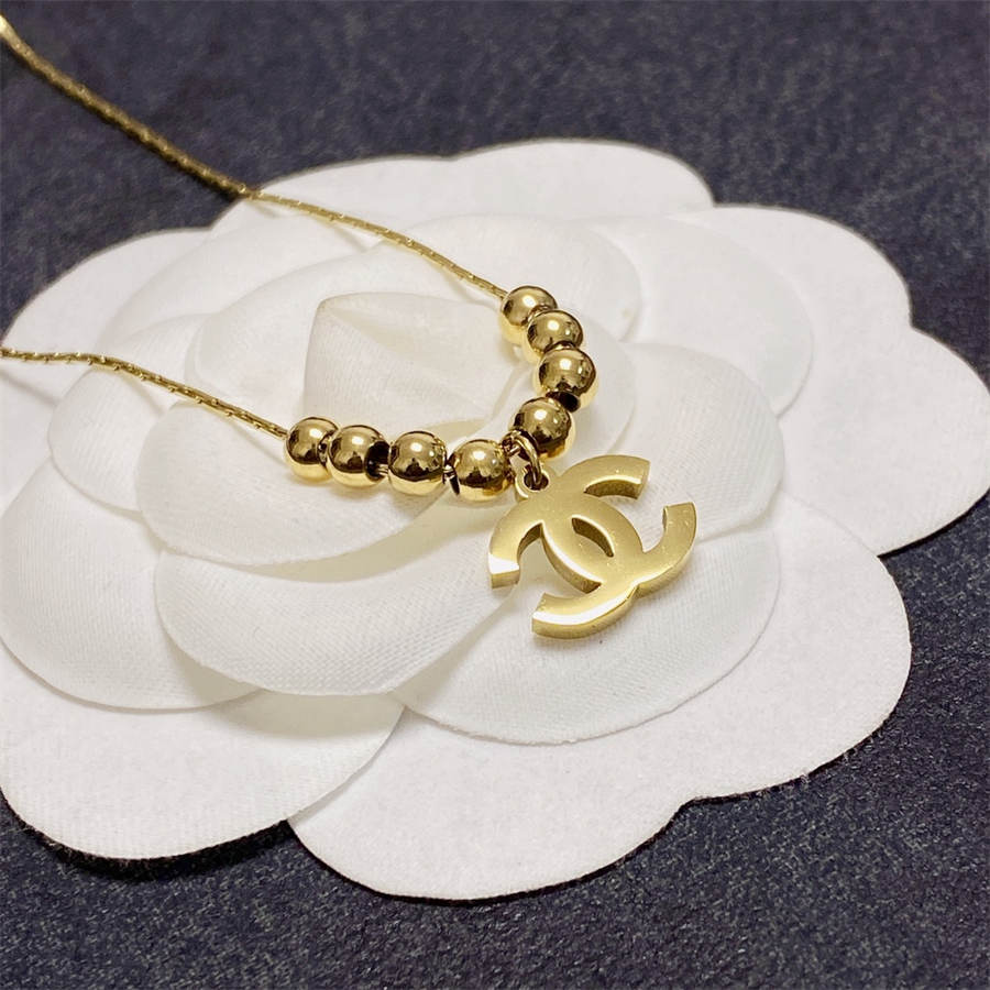 シャネル ダブルC イエローゴールド ビーズ ペンダント ネックレス