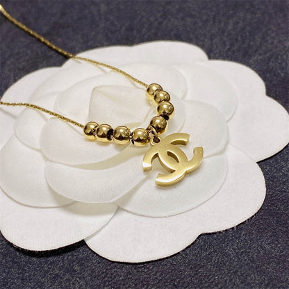 シャネル ダブルC イエローゴールド ビーズ ペンダント ネックレス