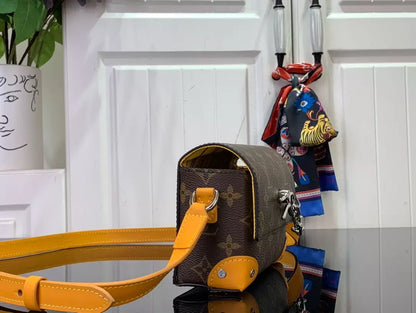 ルイ・ヴィトン スティーマー ウェアラブルウォレット イエロー サフラン モノグラム マカッサル – LW146