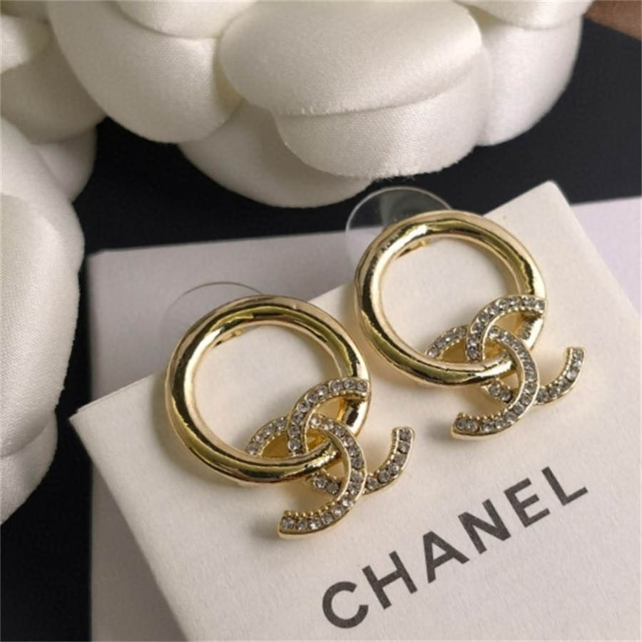シャネル クリスタル ダイヤモンド オープンワーク サークルレター イヤリング